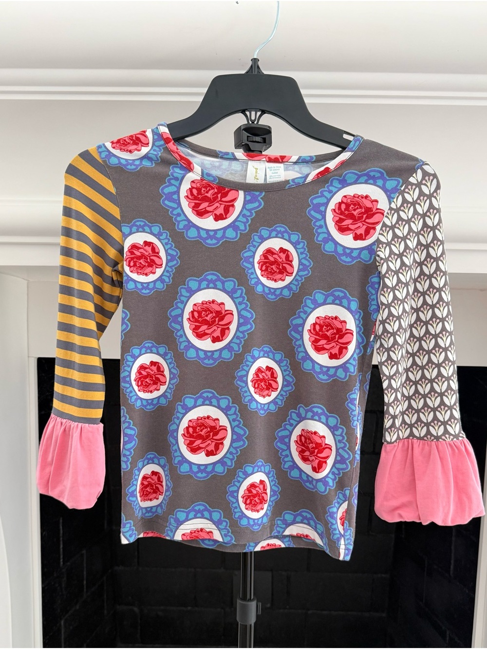 Colorful Mixed-Print Floral Top with Pink Puff Sleeve Cuffs